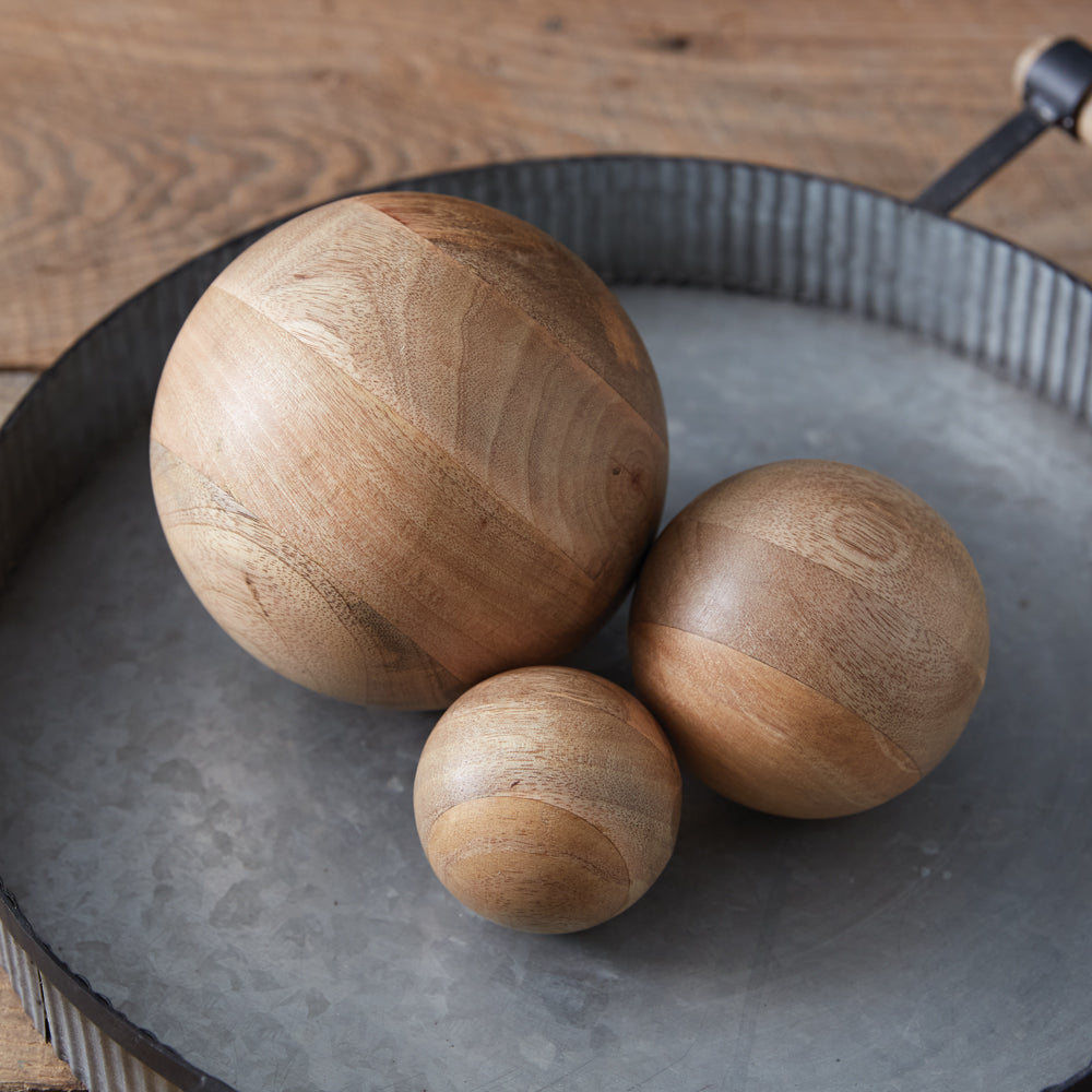 Set of Three Carved Wood Balls